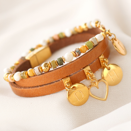 Avec les pendentifs lettres en m&eacute;tal DQ, vous cr&eacute;ez de magnifiques bracelets et boucles d'oreilles personnalis&eacute;s