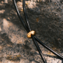 Inspiration avec du cordon en cuir et des pendentifs originaux